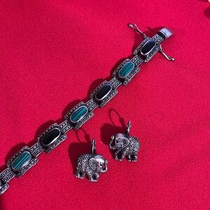Cubic zirconia bracelet and elephant earrings